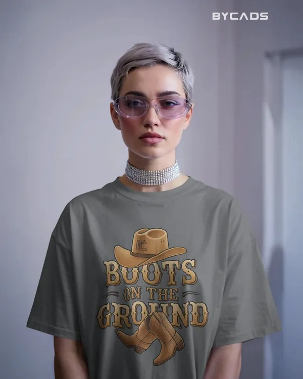 Grey_Cotton_Boots_On_The_Ground_Oversized_Unisex_T-Shirt_|_Western_Graphic_Tee