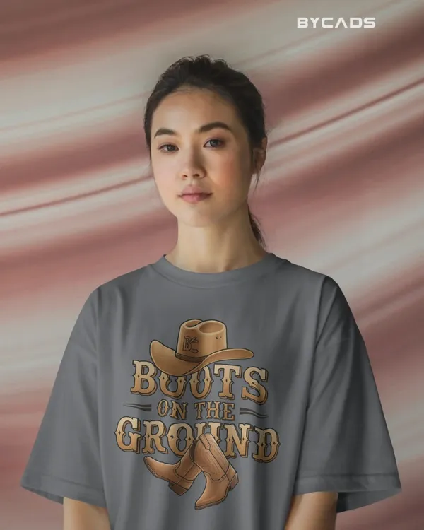 Grey_Cotton_Boots_On_The_Ground_Oversized_Unisex_T-Shirt_|_Western_Graphic_Tee