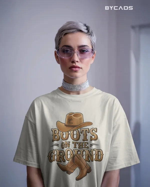 White_Cotton_Boots_On_The_Ground_Oversized_Unisex_T-Shirt_|_Western_Graphic_Tee