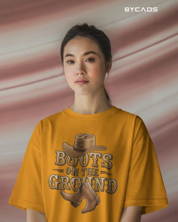 Yellow_Cotton_Boots_On_The_Ground_Oversized_Unisex_T-Shirt_|_Western_Graphic_Tee