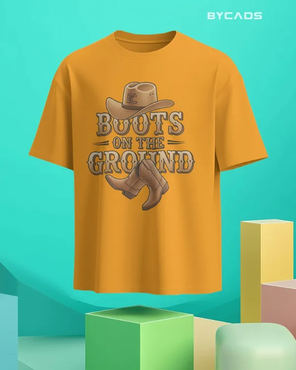 Yellow_Cotton_Boots_On_The_Ground_Oversized_Unisex_T-Shirt_|_Western_Graphic_Tee