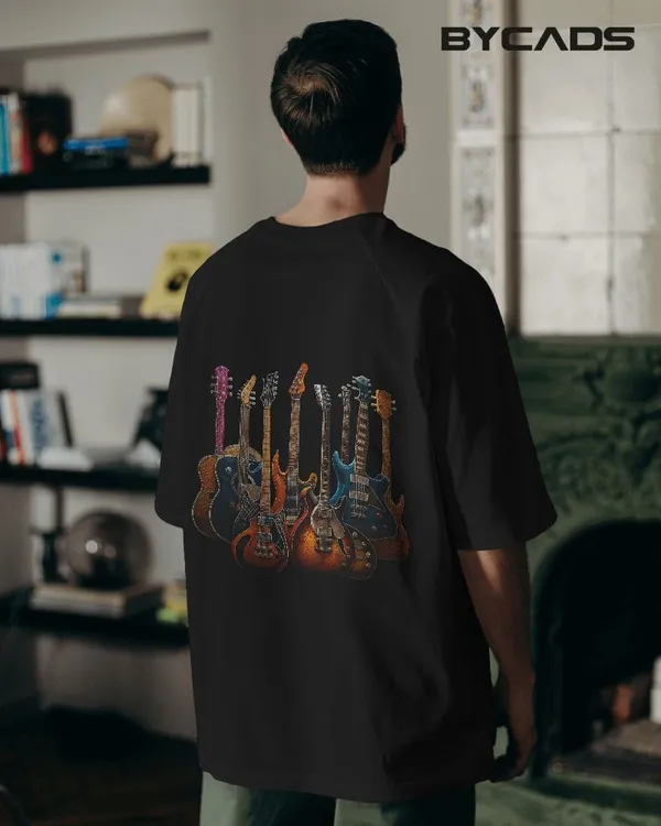 Black_Cotton_Legends_Of_The_Strings_Tee_|_Retro_Guitar_Graphic