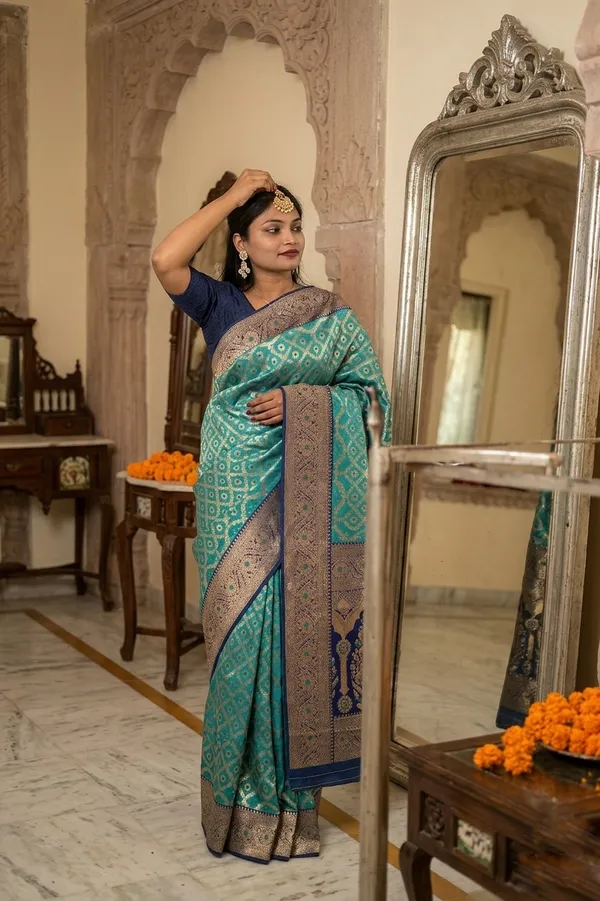 Elegant_Turquoise_Banarasi_Silk_Saree_with_Contrast_Navy_Blue_Zari_Border