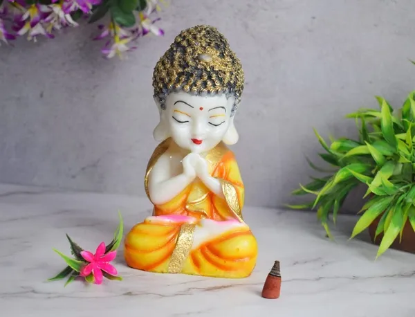 Handicrafts_Baby_Buddha_Showpiece_Resin_&_Sandalwood_Monk_Figurine_for_Home_&_Living_Room_decor,_Perfect_Gift_for_Family_&_Friends_(12X10X18cm,_Orange)