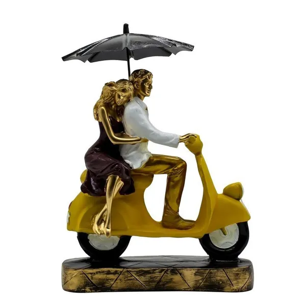 Romantic_Couple_Riding_Yellow_Scooter_Statue_-_A_Symbol_of_Love_and_Adventure
