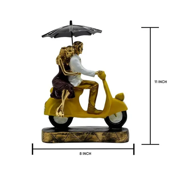 Romantic_Couple_Riding_Yellow_Scooter_Statue_-_A_Symbol_of_Love_and_Adventure