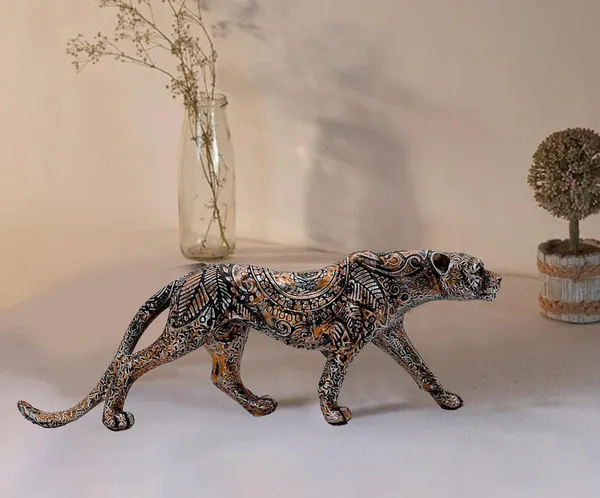 Intricately_Carved_Metal_Leopard_Sculpture_-_Elegant_Jungle_Cat_Figurine_for_Home_&_Office_Decor
