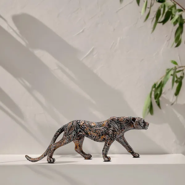 Intricately_Carved_Metal_Leopard_Sculpture_-_Elegant_Jungle_Cat_Figurine_for_Home_&_Office_Decor