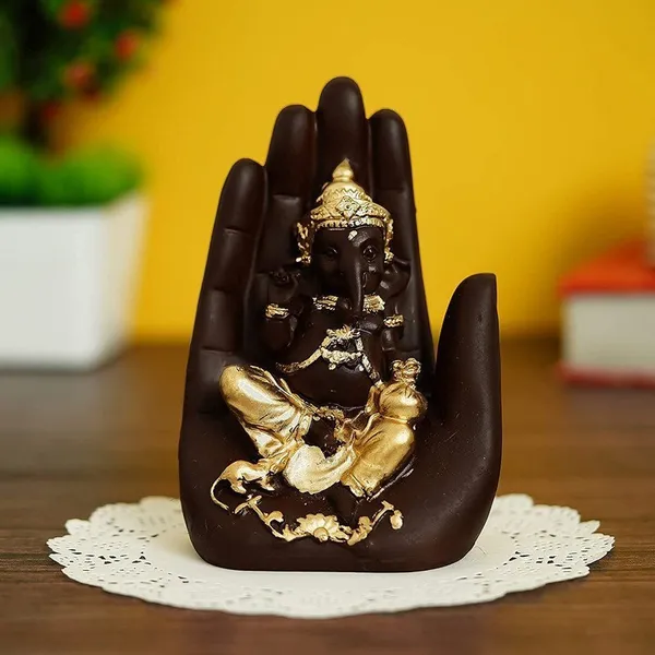 Elegant_Ganesha_Idol_in_Hand_Design_|_Black_&_Gold_Polyresin_Ganpati_Statue_for_Home,_Office_&_Car_Dashboard_Decor_6_Inch