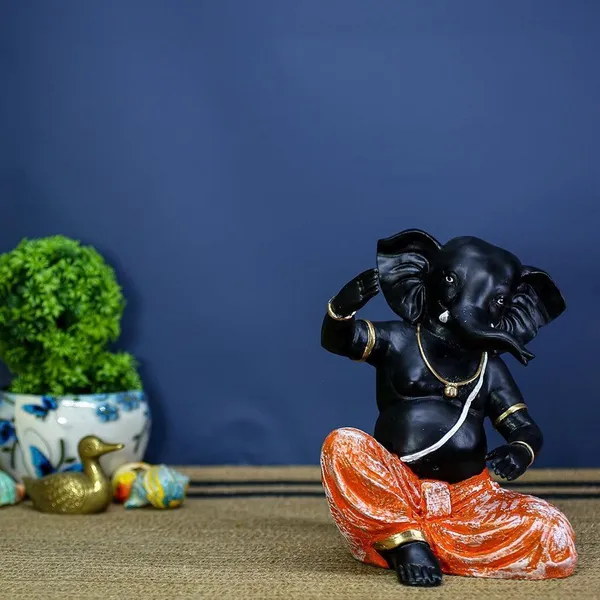 Black_Ganesha_Idol_with_Orange_Dhoti_|_Polyresin_Ganpati_Statue_for_Home_Decor,_Pooja_Room,_Office_&_Festive_Gift_|_Decorative_Ganesh_Murti_6_Inch