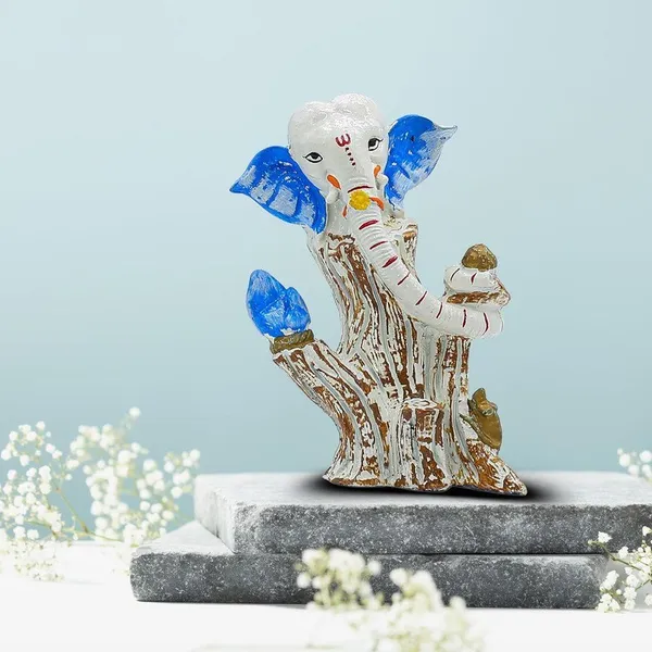 White_&_Blue_Ganesha_Idol_on_Tree_Log_|_Polyresin_Ganpati_Statue_for_Home_Decor,_Pooja_Room,_Car_Dashboard_&_Gift_|_Decorative_Ganesh_Murti_5_Inch