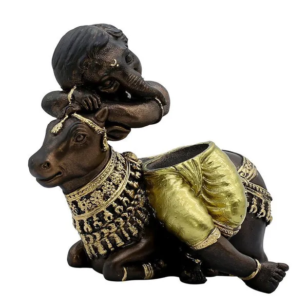 Baby_Ganesha_Idol_Resting_on_Cow_Antique_Finish_Polyresin_Ganpati_Murti_with_Golden_Dhoti_for_Home_Decor,_Pooja_Room_&_Gift,_6_Inch