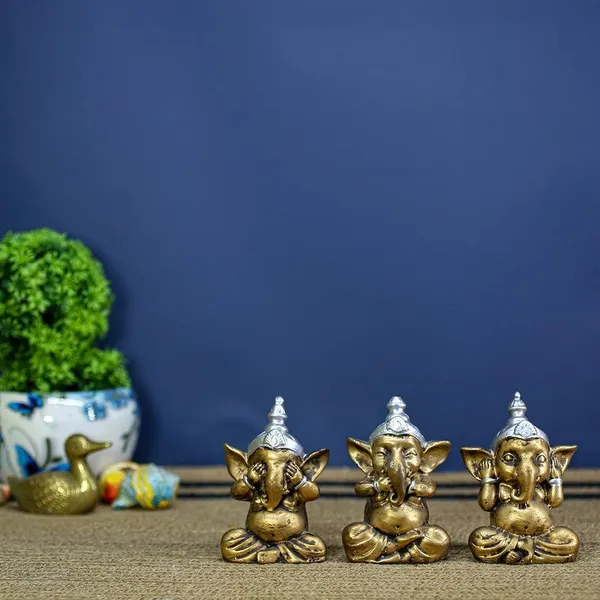 Set_of_3_Wise_Ganesha_Idols_Brass_Finish_Ganpati_Statues_in_See_No_Evil,_Hear_No_Evil,_Speak_No_Evil_Pose_for_Home_Decor_&_Gift_3_Inch