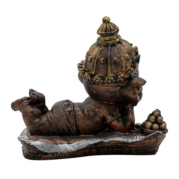 Ganesha_on_Conch_Shell_Statue_-_Metal_Gold_Accents_Decorative_Figurine_for_Pooja_Room_&_Meditation