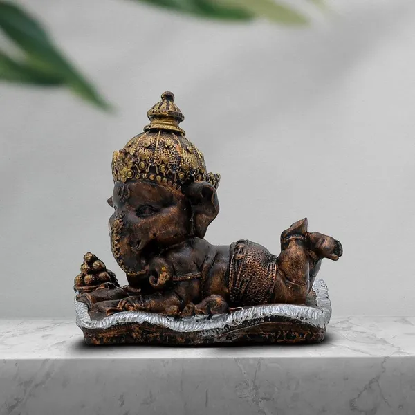 Ganesha_on_Conch_Shell_Statue_-_Metal_Gold_Accents_Decorative_Figurine_for_Pooja_Room_&_Meditation