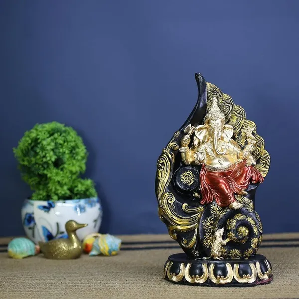 Ganesha_Statue_Sitting_on_a_Mouse_-_Black_and_Gold_Decorative_Figurine_for_Home_&_Office