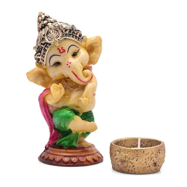 Handcrafted_Ganesha_Tea_Light_Candle_Holder_Metal_Resin,_Religious_Statue_Showpiece