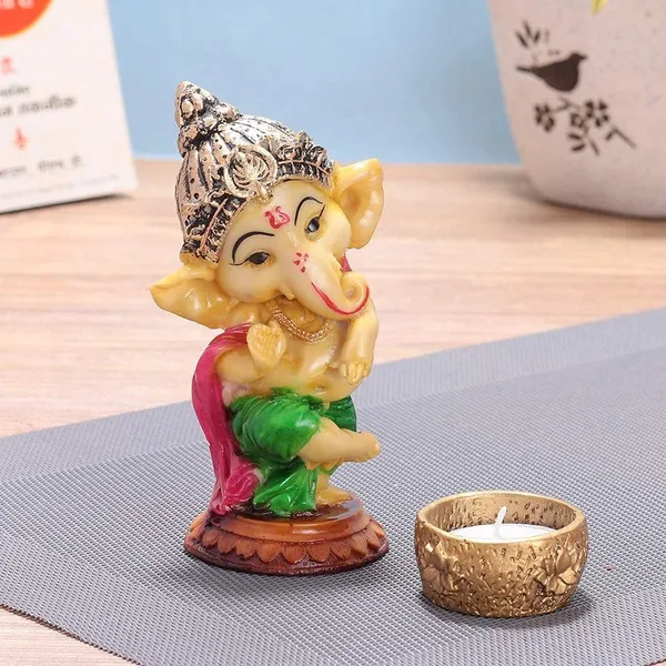 Handcrafted_Ganesha_Tea_Light_Candle_Holder_Metal_Resin,_Religious_Statue_Showpiece