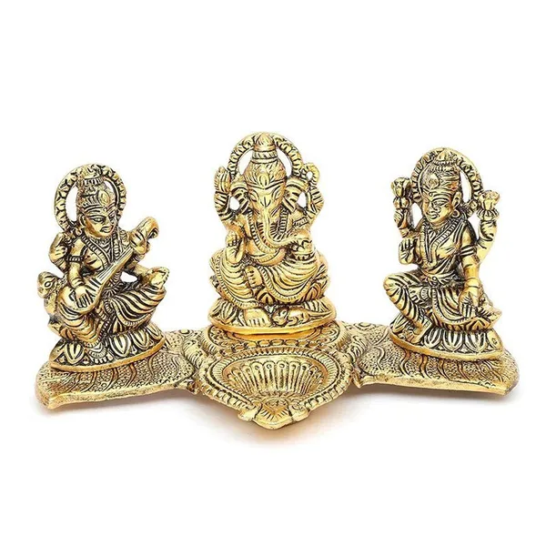 Brass_Lakshmi-Ganesha-Saraswati_Diya_Holder_on_Leaf_Plate_Gold-Tone_Hindu_Trio_Statues_with_Oil_Lamp_for_Gifting