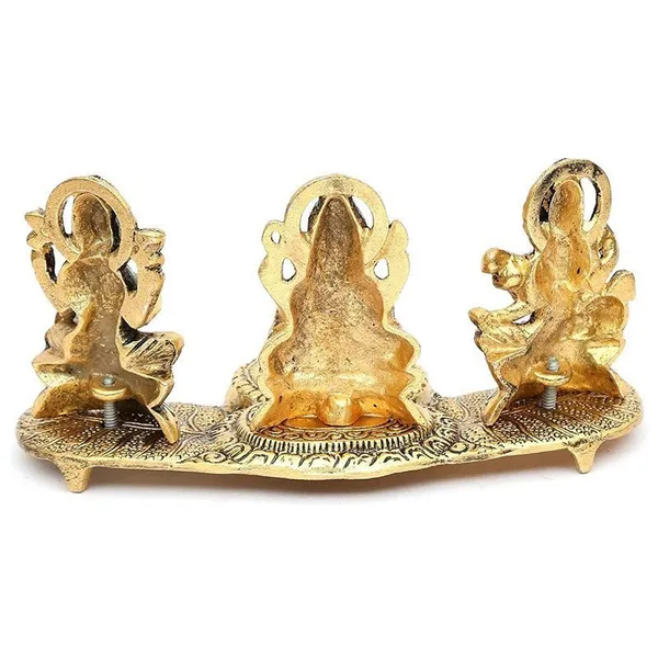 Brass_Lakshmi-Ganesha-Saraswati_Diya_Holder_on_Leaf_Plate_Gold-Tone_Hindu_Trio_Statues_with_Oil_Lamp_for_Gifting