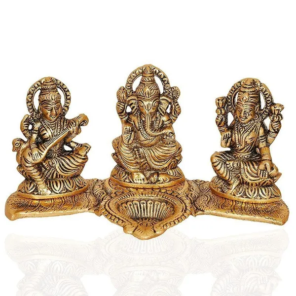 Brass_Lakshmi-Ganesha-Saraswati_Diya_Holder_on_Leaf_Plate_Gold-Tone_Hindu_Trio_Statues_with_Oil_Lamp_for_Gifting