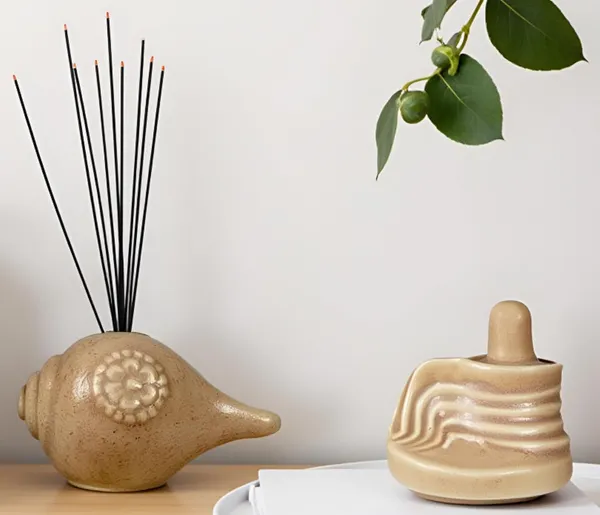 Shivling_And_Shankh_Brown__Ceramic_Figurine_Showpiece_Artifact_Abstract_Animal_Statue_For_Indoor,_Home,_Office_Decor,(Shivling-L-_8_X_W_-_6.5_X_H_-_8_Cm/Shankh-L-8_X_W_-_5_X_H_-_5_Cm)