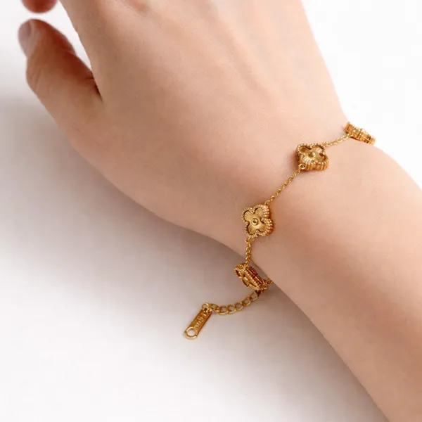 Ridhvee_Anti-Tarnish_Gold_Plated_Floral_Charm_Bracelet_For_Women_&_Girls_|_Elegant_Flower_Design_Adjustable_Chain_Bracelet_|_Skin_Friendly_Lightweight_Fashion_Jewellery_|_Rv-At-Brc-014