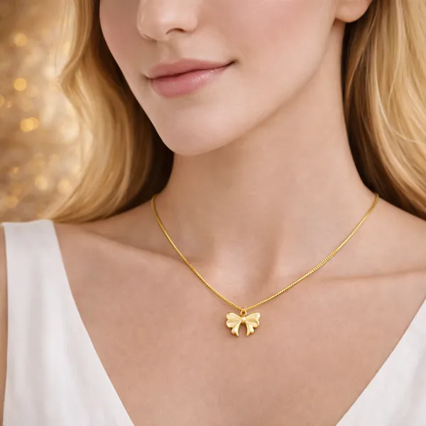 Ridhvee_Anti-Tarnish_Gold_Plated_Bow_Pendant_Necklace_For_Women_&_Girls_|_Elegant_Ribbon_Bow_Charm_Chain_|_Skin_Friendly_Lightweight_Fashion_Jewellery_|_Rv-At-Cpd-014