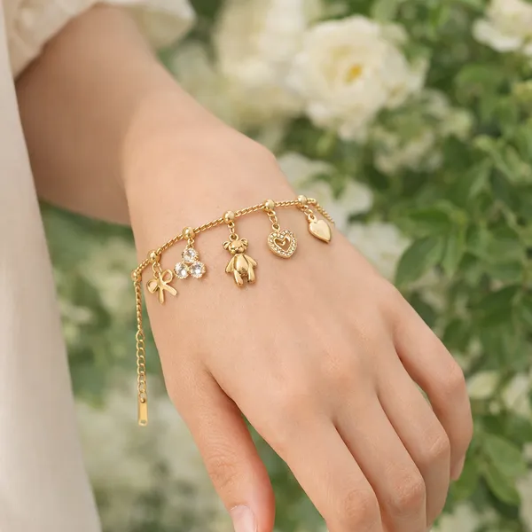 RIDHVEE_Gold_Plated_Anti_Tarnish_Charm_Bracelet_for_Women_&_Girls_|_Cute_Teddy,_Heart_&_Bow_Design_with_American_Diamond_Accents_|_Premium_Skin_Friendly_Adjustable_Chain_Bracelet_|_Party_Wear_Jewellery_RV-AT-BRC-017