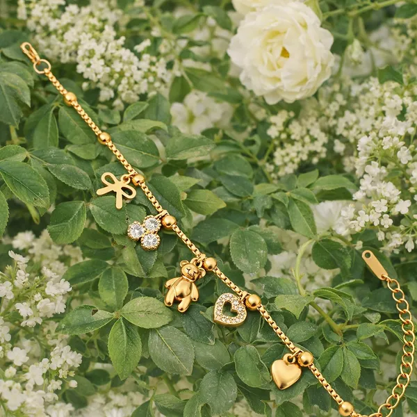 RIDHVEE_Gold_Plated_Anti_Tarnish_Charm_Bracelet_for_Women_&_Girls_|_Cute_Teddy,_Heart_&_Bow_Design_with_American_Diamond_Accents_|_Premium_Skin_Friendly_Adjustable_Chain_Bracelet_|_Party_Wear_Jewellery_RV-AT-BRC-017