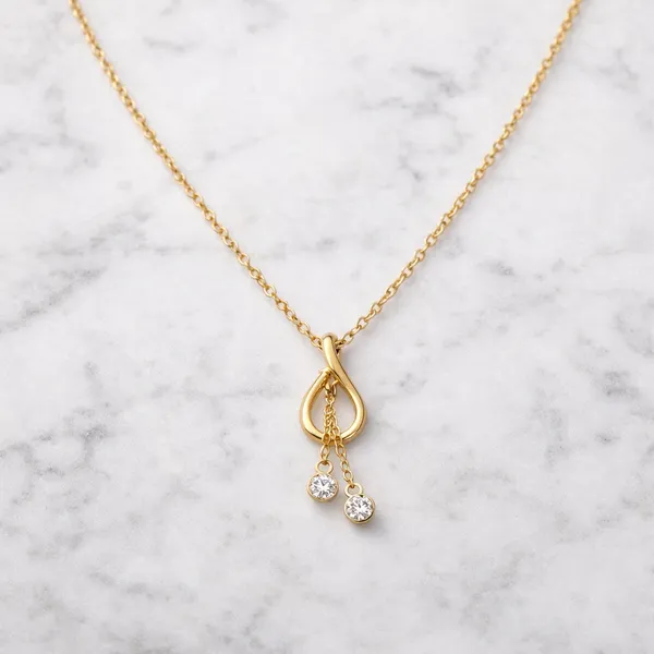 RIDHVEE_Knot_Drop_Pendant_Necklace_for_Women_|_Anti-Tarnish_Gold_Plated_Chain_with_American_Diamond_Dangle_Charms_|_Elegant_Minimalist_Daily_Wear_&_Party_Wear_Jewellery_(RV-AT-CPD-025)