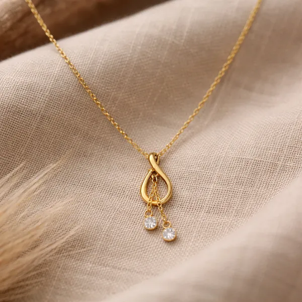 RIDHVEE_Knot_Drop_Pendant_Necklace_for_Women_|_Anti-Tarnish_Gold_Plated_Chain_with_American_Diamond_Dangle_Charms_|_Elegant_Minimalist_Daily_Wear_&_Party_Wear_Jewellery_(RV-AT-CPD-025)