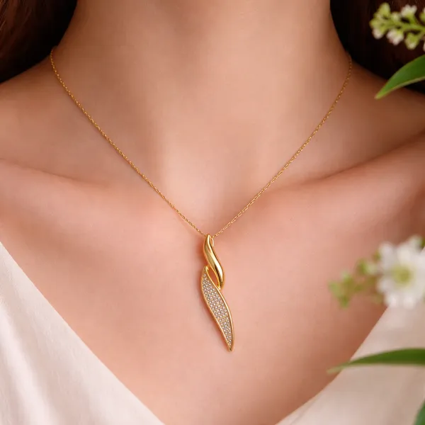 RIDHVEE_Designer_Leaf_Pendant_Necklace_for_Women_|_Anti-Tarnish_Gold_Plated_Chain_with_American_Diamond_Curve_Pendant_|_Elegant_Daily_Wear_&_Party_Wear_Jewellery_(RV-AT-CPD-026)