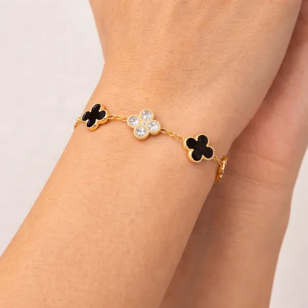 Ridhvee_Anti-Tarnish_Gold_Plated_Clover_Charm_Bracelet_For_Women_&_Girls_|_Black_&_White_Floral_Clover_Design_|_Adjustable_Chain_|_Skin_Friendly_Lightweight_Fashion_Jewellery_|_Rv-At-Brc-009