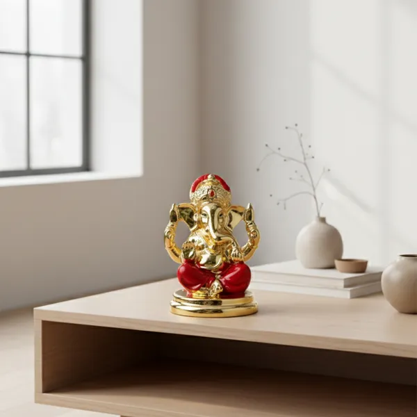 Golden_Ganesha_Idol_with_Red_Dhoti_|_Mini_Lord_Ganesh_Murti_for_Home_&_Office_D�cor_|_Vastu_Ganesha_Statue_for_Car_Dashboard_|_Pooja_Decor_&_Festive_Gift_Item