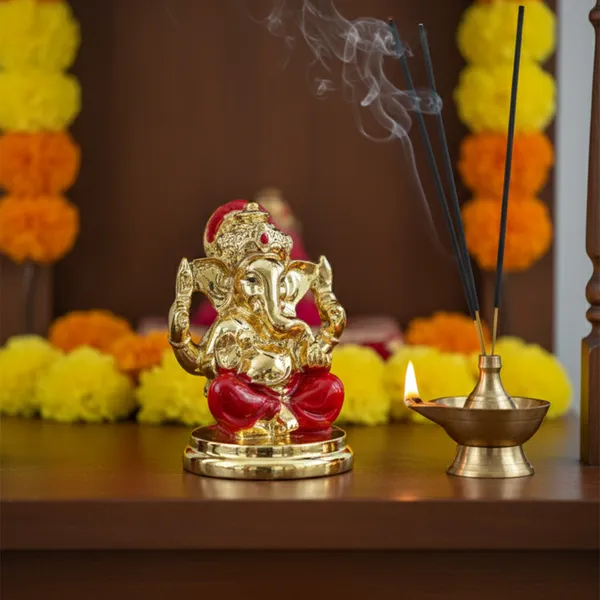 Golden_Ganesha_Idol_with_Red_Dhoti_|_Mini_Lord_Ganesh_Murti_for_Home_&_Office_D�cor_|_Vastu_Ganesha_Statue_for_Car_Dashboard_|_Pooja_Decor_&_Festive_Gift_Item