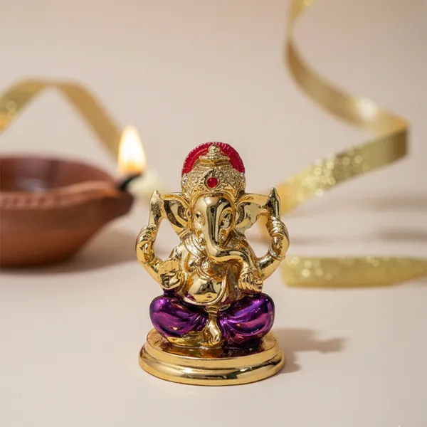 Golden_Ganesha_Idol_with_Purple_Dhoti_&_Red_Crown_|_Mini_Ganpati_Murti_for_Home_Mandir,_Office_Desk_&_Car_Dashboard_|_Antique_Finish_Hindu_God_Idol_for_Vastu,_Pooja_&_Gifting
