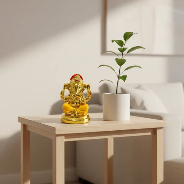Golden_Ganesha_Idol_with_Yellow_Dhoti_|_Mini_Lord_Ganesh_Statue_for_Home_Temple,_Office_Desk_&_Car_Dashboard_|_Vastu_Ganpati_Murti_for_Diwali,_Housewarming_&_Gift_D�cor