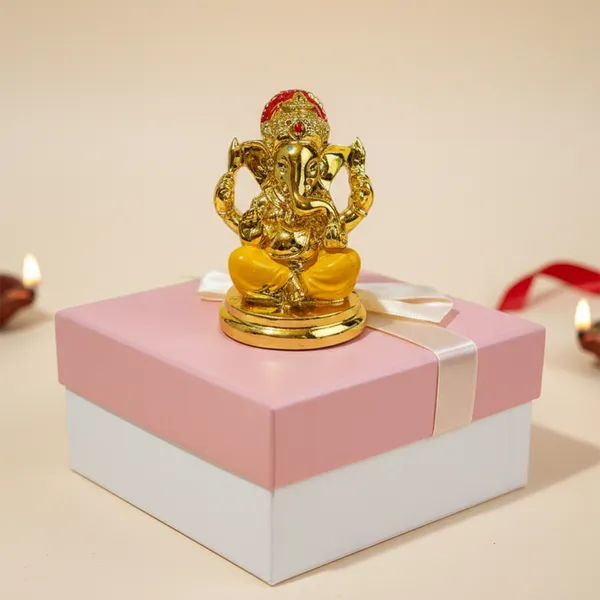 Golden_Ganesha_Idol_with_Yellow_Dhoti_|_Mini_Lord_Ganesh_Statue_for_Home_Temple,_Office_Desk_&_Car_Dashboard_|_Vastu_Ganpati_Murti_for_Diwali,_Housewarming_&_Gift_D�cor