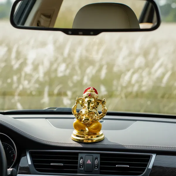 Golden_Ganesha_Idol_with_Yellow_Dhoti_|_Mini_Lord_Ganesh_Statue_for_Home_Temple,_Office_Desk_&_Car_Dashboard_|_Vastu_Ganpati_Murti_for_Diwali,_Housewarming_&_Gift_D�cor