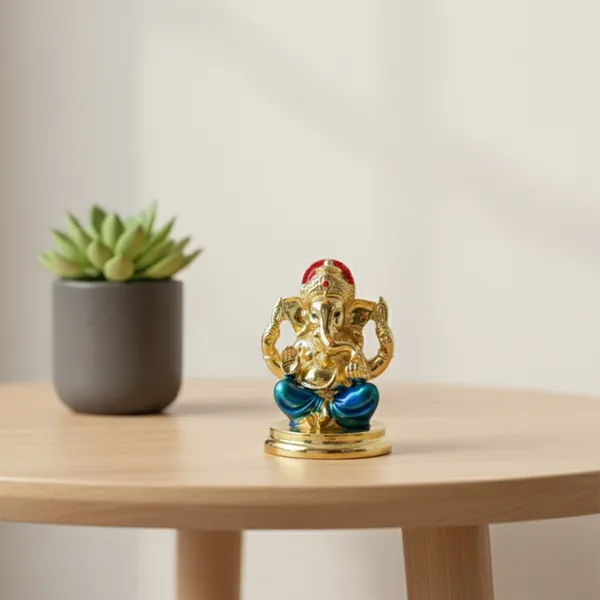 Golden_Ganesha_Idol_With_Blue_Dhoti_Mini_Decorative_Murti_for_Home_Temple_Office_Desk_Car_Dashboard_Spiritual_Vastu_Gift