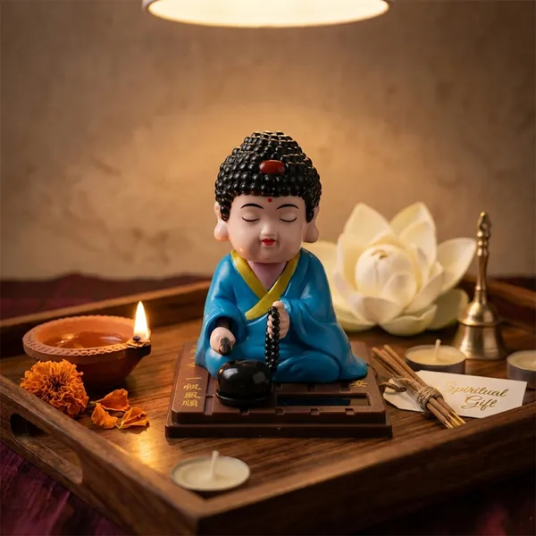Solar_Power_Buddha_Statue_�_Meditation_Monk_Moving_Idol_with_Beads,_Feng_Shui_Spiritual_Decor_for_Home,_Office_&_Car_Dashboard,_Cute_Buddha_Showpiece_Toy,_No_Battery_Required_(Blue,_8x8x9_cm)