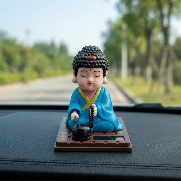 Solar_Power_Buddha_Statue_�_Meditation_Monk_Moving_Idol_with_Beads,_Feng_Shui_Spiritual_Decor_for_Home,_Office_&_Car_Dashboard,_Cute_Buddha_Showpiece_Toy,_No_Battery_Required_(Blue,_8x8x9_cm)