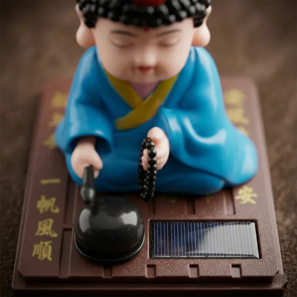 Solar_Power_Buddha_Statue_�_Meditation_Monk_Moving_Idol_with_Beads,_Feng_Shui_Spiritual_Decor_for_Home,_Office_&_Car_Dashboard,_Cute_Buddha_Showpiece_Toy,_No_Battery_Required_(Blue,_8x8x9_cm)