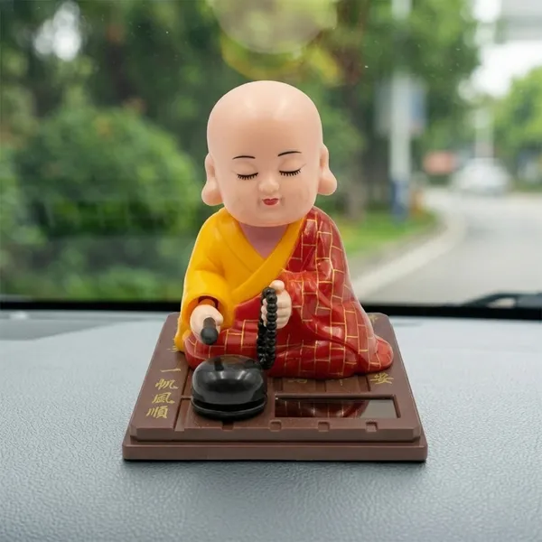 Solar_Powered_Nodding_Buddha_–_Zen_Desk_&_Car_Dashboard_Decor