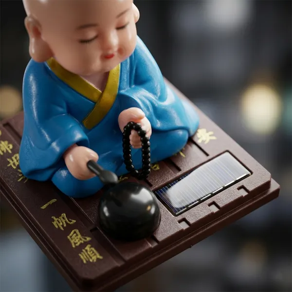 Solar_Powered_Nodding_Buddha_–_Zen_Desk_&_Car_Dashboard_Decor