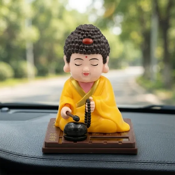 Solar_Power_Buddha_Dancing_Idol_for_Car_Dashboard,_Home_&_Office_Decor_Solar_Powered_Moving_Showpiece,_Feng_Shui_Lucky_Buddha_Figurine_for_Peace_&_Positivity_(8x8x9_cm)