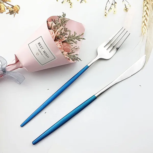 Silver_Stainless_Steel_Flatware_Cutlery_Set_Kitchen_Utensil_Set_With_Spoons_And_Forks_For_Kitchen_Forks_And_Spoons_Ware_(Pack_Of_4_)