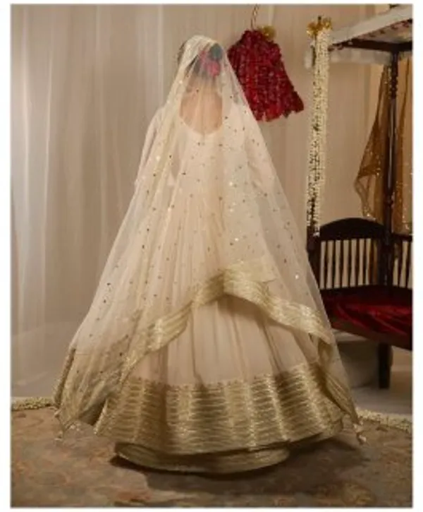 Elegant_Off_White_Anarkali_Salwar_Suit_With_Golden_Embellished_Border