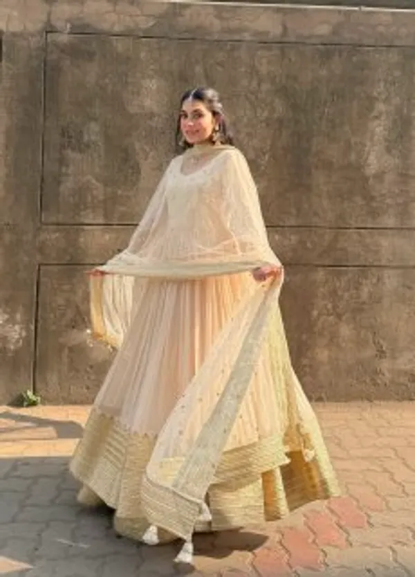 Elegant_Off_White_Anarkali_Salwar_Suit_With_Golden_Embellished_Border